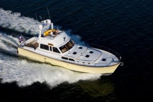 Mad Max, 67' Zurn-designed flybridge cruiser built by Lyman-Morse