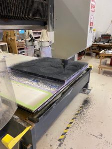 Boston Custom House clock tower hands under construction with CNC machine