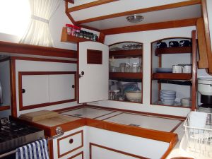 Lyman-Morse Hood Stowaway Ketch Baccara III galley cupboards